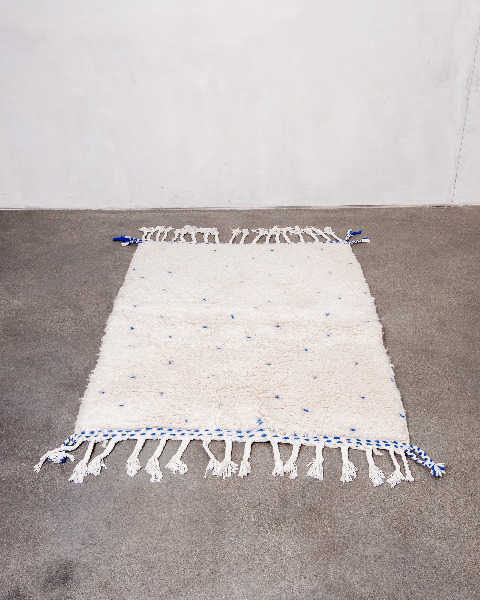 Modern, designer, handcrafted Berber rug from Morocco. Beniourain carpet with beautiful colours and patterns and fluffy wool texture.